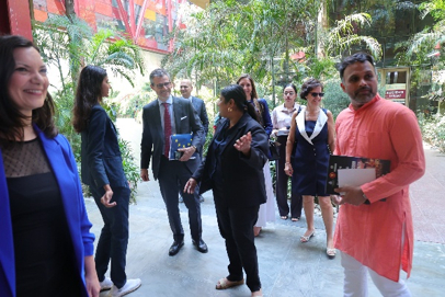 CES coordinators welcome the ambassador at the exhibition